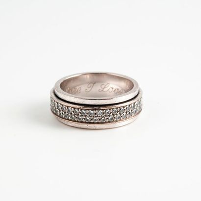 PIAGET, Possession 

Bague en or gris (750) centrée d'un anneau mobile entièrement...
