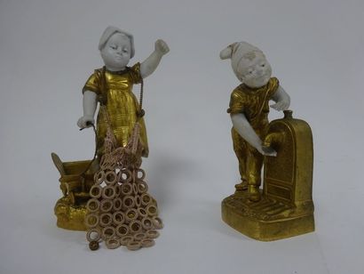 G.O. BAILLY (XIX-XXème siècles) 

Deux personnages en bronze doré et biscuit. 

L'un...