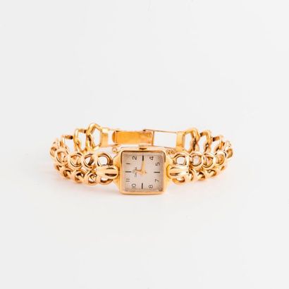 OMEGA 

Montre bracelet de dame en or jaune (750).

Boîtier carré. 

Cadran à fond...