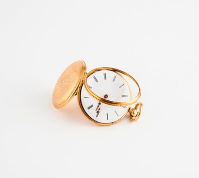  Petite montre de col en or jaune (750). 
Fond du boîtier guilloché à cartouche chiffré....