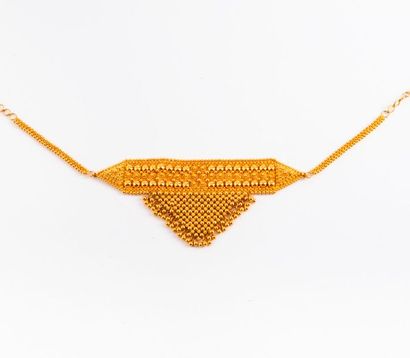 null Ornement de cheville en or jaune (750) à motif grènetis. 

Fermoir crochet réglable.

Style...