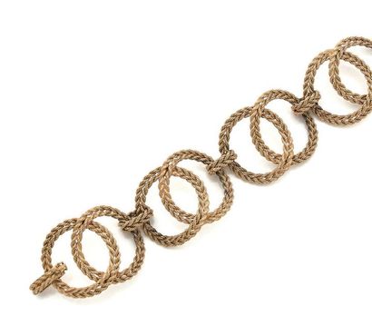 null Bracelet articulé en or jaune (750) composé de quatre maillons formés de deux...