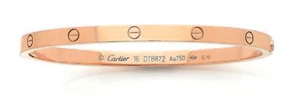 CARTIER “LOVE”
Bracelet jonc ouvrant de jeune fille en or rose 750 millièmes, à décor...