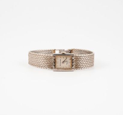 SYWIMA 

Montre bracelet de dame en or gris (750).

Boîtier rectangulaire et lunette...