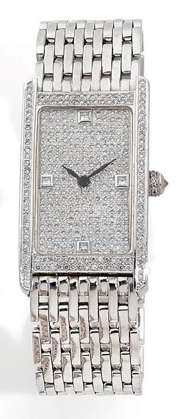 null Montre bracelet de dame en or gris (750).
Boîtier de forme rectangulaire légèrement...