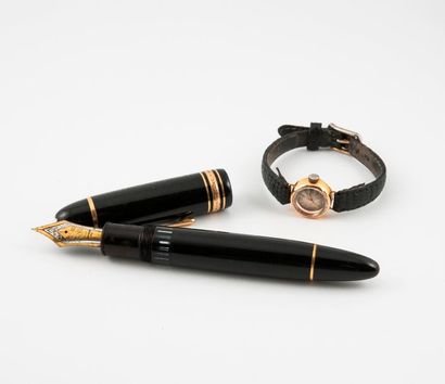 MONTBLANC, Meisterstruck 

Stylo plume en résine noire et attributs dorés.

Signé.

Usures,...