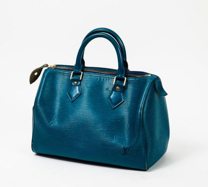 Louis VUITTON, Speedy 

Sac en cuir épi bleu, à deux anses porté main. 

Intérieur...