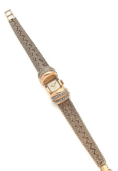 Michel HERBELIN Montre bracelet de dame en ors jaune et gris (750).
Boîtier carré...
