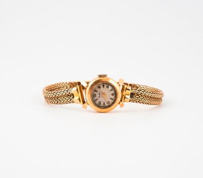 DERMONT 

Montre bracelet de dame en or jaune (750).

Boîtier rond. 

Cadran à fond...