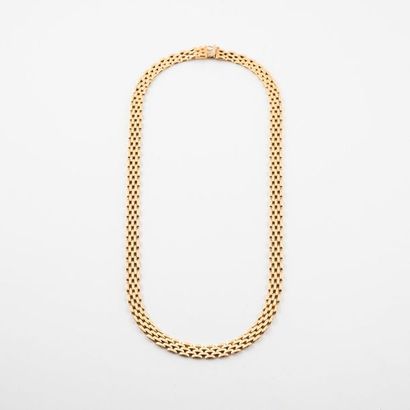 null Collier en or jaune (750) à maille vannerie. 

Fermoir cliquet avec huit de...