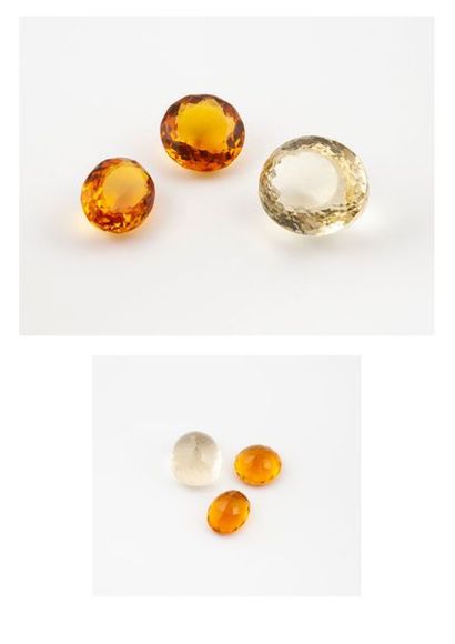 null Trois citrines :

- une pâle, ovale facettée de 127 carats. 

- une ovale facettée...