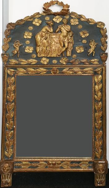 Italie, début du XIXème siècle 
Miroir à fronton en bois sculpté et stuc dorés sur...