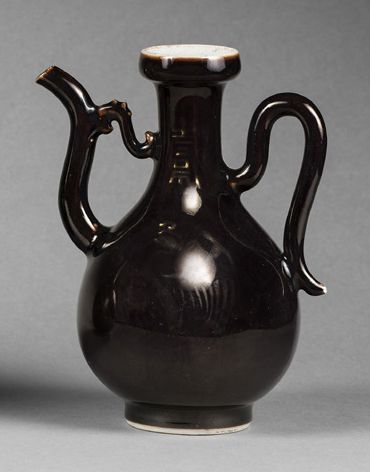 CHINE - Epoque QIANLONG (1736 - 1795) 
Two pair of black enameled porcelain pourers...