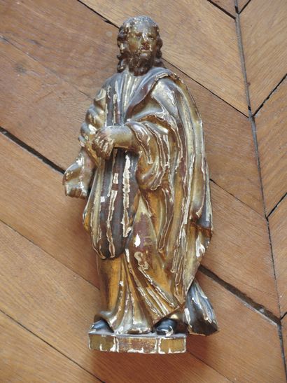 null STATUETTE de saint personnage en bois peint et doré, le dos ébauché.
XVIIIe...