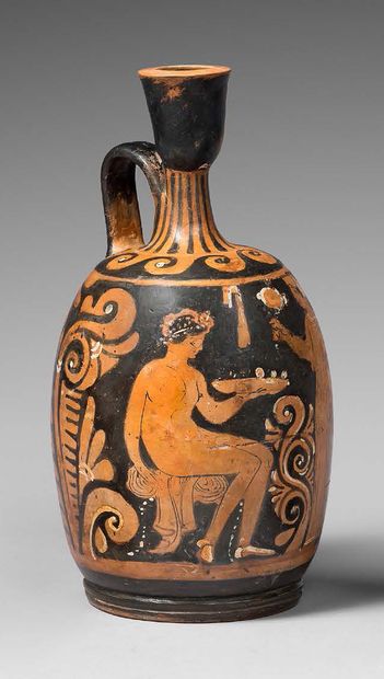 null Red-figured aryballisque lekythos decorated with a scene of a seated nude ephebe...