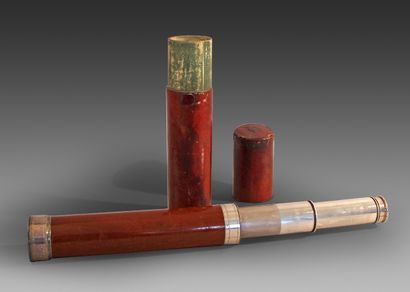 null Telescopic mahogany and silver plated metal LONG VIEW, monogrammed on two prints.
Red...