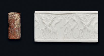 null Red calcite cylinder seal engraved with a scene of an animal master. Near East...