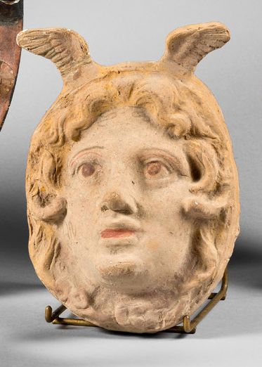 null Gorgon mask in high relief from a monumental askos.
Clay and pigments. Gaps...