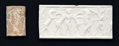 null Cylinder-seal engraved with Gilgamesh mastering two prides attacked by a lion....