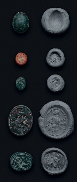 null Lot of three engraved scarabs, a triton, a person_x0002_nage and a bird), in...