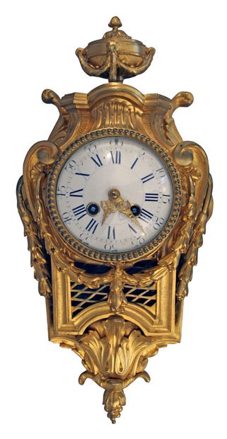 null SMALL gilt bronze CARTEL with enamel dial. 
 Transitional style, late 19th century.
H....