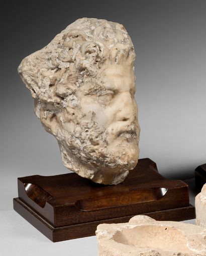 null Head of a satyr (?) in marble. The details of the beard and the hair are treated...