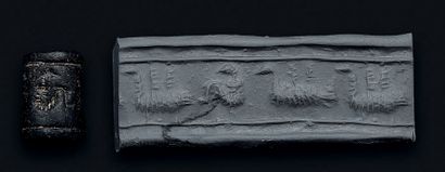 null Small black calcite cylinder seal engraved with a parade of animals. Near East...