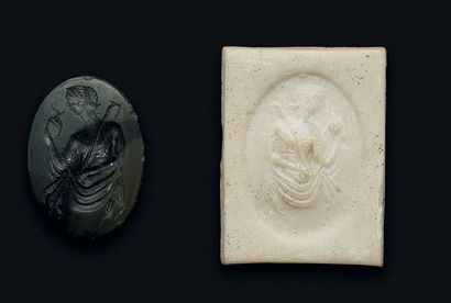 null Large chrysoprase intaglio engraved with a deity holding a shepherd's staff...