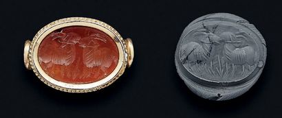 null 
Intaglio engraved with two beakers facing each other. Carnelian.



Sassanid...