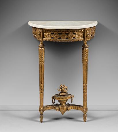 null SMALL HALF-LUNE CONSOLE in carved and gilded wood, the belt openworked with...