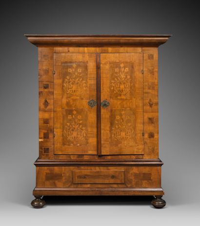 null LOW CABINET in native wood veneer, the two leaves inlaid with four vases of...