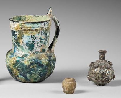 null Lot composed of a pitcher with a handle, a globular vase decorated with pastilles...