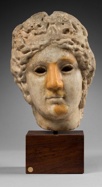 null Head representing the god Bacchus whose hair is ondu_x0002_lée is girded with...