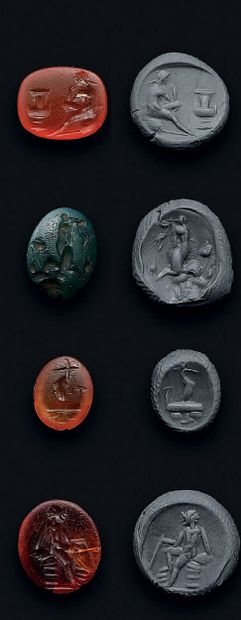 null 
Lot of four intaglios engraved with an unidentified subject, a satyr sitting...