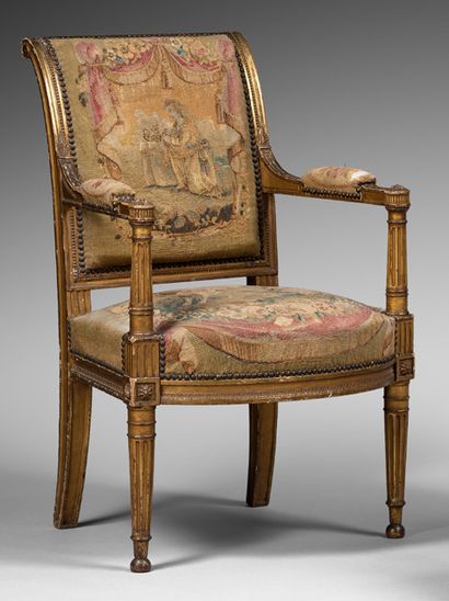 null Gilded wood armchair. Wrapped backrest with pearl frieze
Armrests supports in...