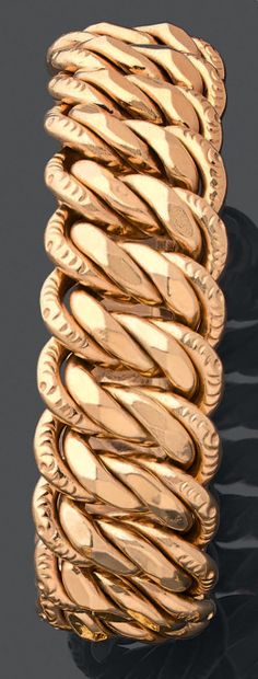 null Bracelet large articulé en or jaune 750 millièmes, les maillons de forme ovale...