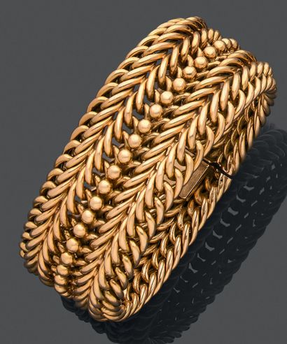 null Bracelet ruban articulé en or jaune 750 millièmes, les maillons entrelacés,...