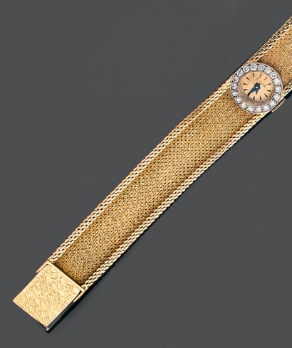 null Montre bracelet de dame en or jaune 750 millièmes, la montre de forme ronde,...
