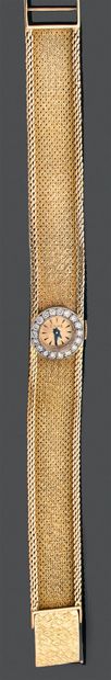 null Ladies' wristwatch in yellow gold 750 thousandths, the round watch, the wrist...