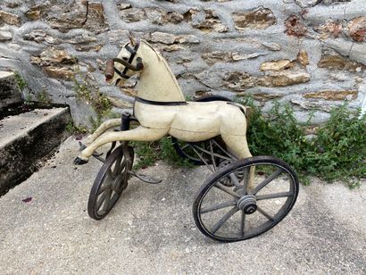 null Child tricycle with a horse. End of XIX.