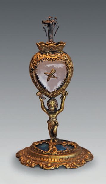 null Glass and gilt metal perfume bottle on an oval blue agate base decorated with...