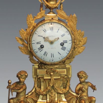 null A white marble and ormolu clock of children illustrating Painting and Sculpture,...