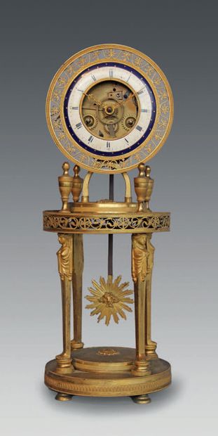 null Skeleton clock with openwork decoration of stylized palmettes and foliage, resting...