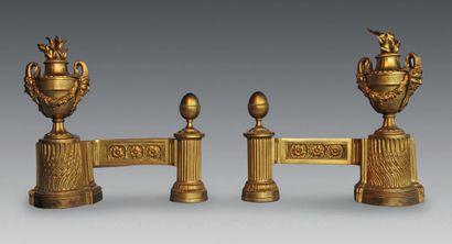null Pair of andirons with vases and satyrs decorated with garlands; (without irons)....