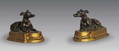 null Pair of patinated bronze and gilt bronze paper plates representing two greyhounds,...