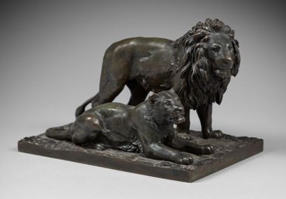 D'après Antoine-Louis BARYE Lion debout et lionne couchée
Épreuve en bronze patiné,...