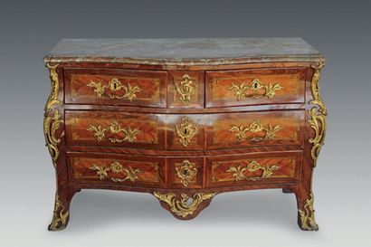 null Violet and rosewood chest of drawers, opening with five drawers on three rows,...