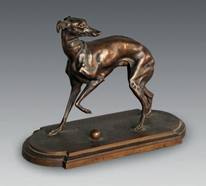 null A brown patina bronze figure of a doggy with a ball after Pierre-Jules mène.
Late...