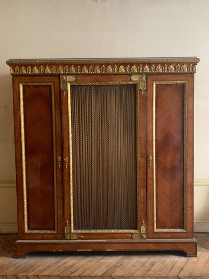 null Important library cabinet in wood veneer and marquetry opening with three doors,...