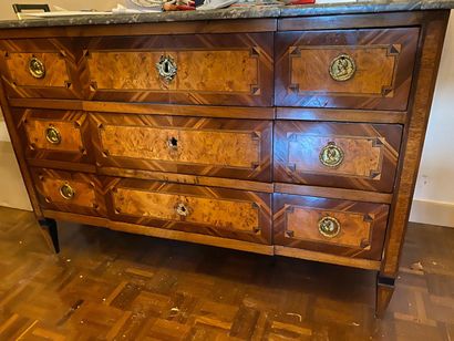 null Veneer chest of drawers and marquetry in frames, the front with a slight central...